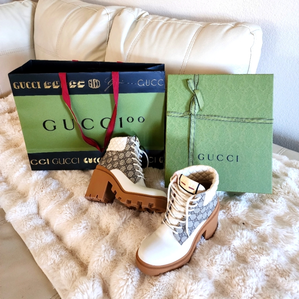 GUCCI Trip GG logo ankle boots lugg sole
